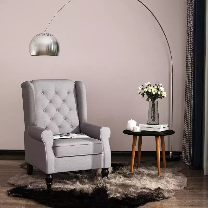 Fauteuil d'appoint Okak, fauteuil de salon capitonné avec coussin arrondi rembourré, fauteuil à dossier haut et accoudoirs avec pieds en bois pour salon et chambre