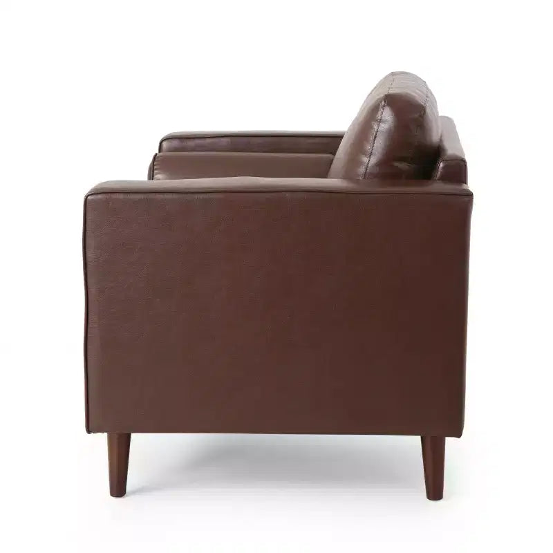 Fauteuil club capitonné contemporain en similicuir GDFStudio Hixon avec traversins