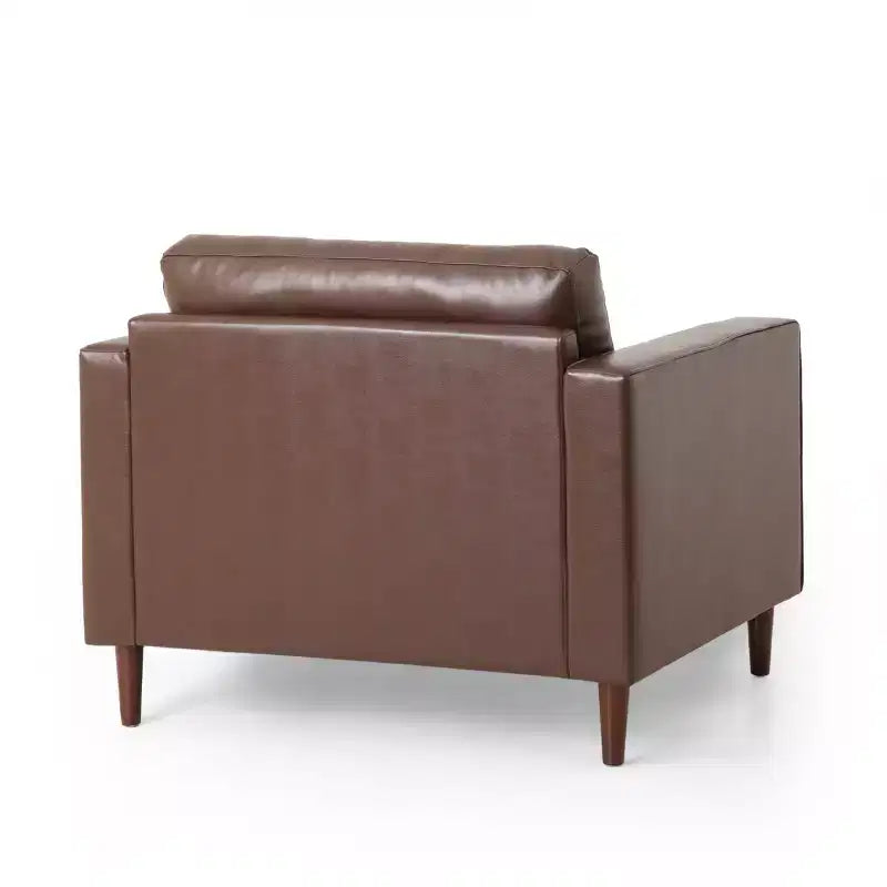 Fauteuil club capitonné contemporain en similicuir GDFStudio Hixon avec traversins