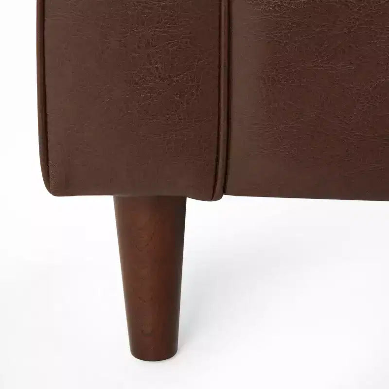 Fauteuil club capitonné contemporain en similicuir GDFStudio Hixon avec traversins