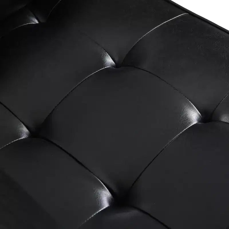 Fauteuil club capitonné contemporain en similicuir GDFStudio Hixon avec traversins