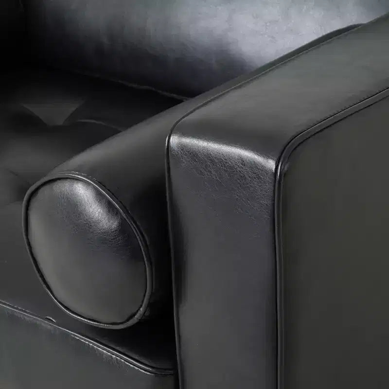 Fauteuil club capitonné contemporain en similicuir GDFStudio Hixon avec traversins