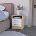 This Nightstand Cartiz, Two Drawers, White / Light Oak Finish combines contemporary style with smart storage solutions, creating a space saving.